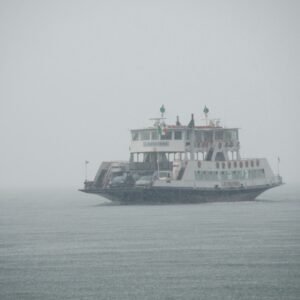a large boat floating on top of a large body of water